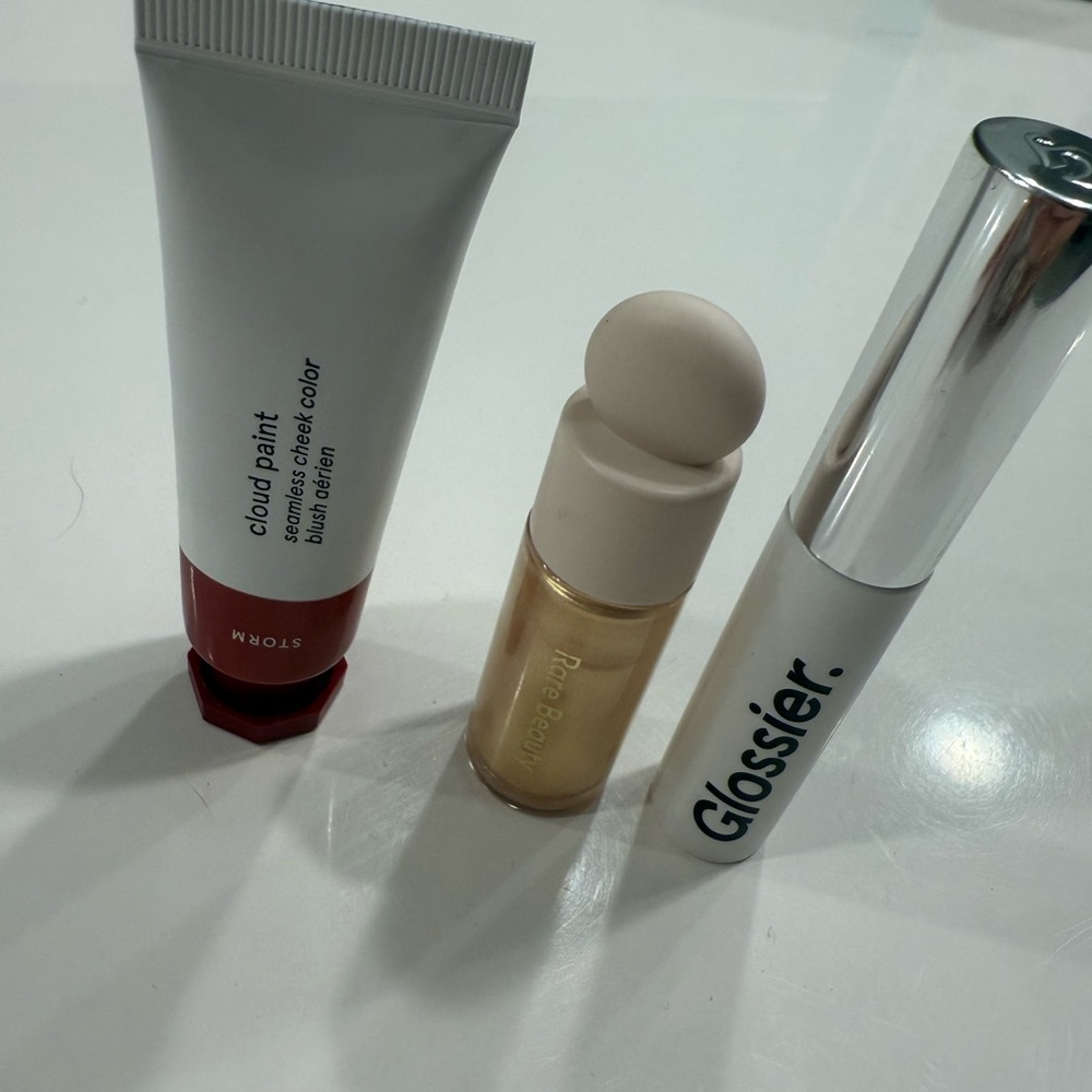 Glossier Cloud cheek Paint rare Beauty Liquid Highlighter and glossier boy brow